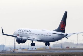 A Boeing 777 has clipped the tail of another plane at Toronto airport