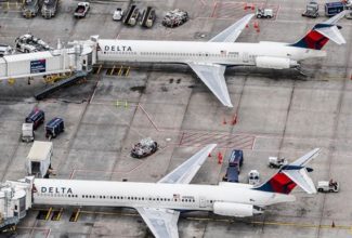 Delta puts brakes on planned capacity growth