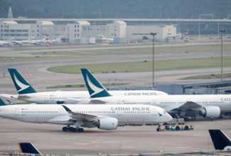 Cathay Pacific is flying into a $1.3 billion loss