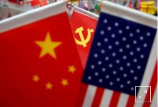 U.S. accuses Chinese nationals of hacking spree for COVID-19 data, defense secrets