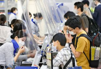 Unruly anti-mask passengers disrupt Japanese airlines