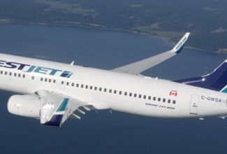 Canada's WestJet cuts staff, blames new testing requirements