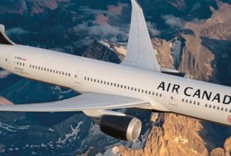 Air Canada temporarily cuts staff and int'l routes