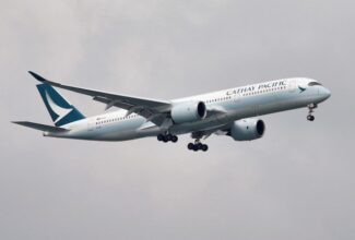 Cathay Pacific's loss shrinks in first half