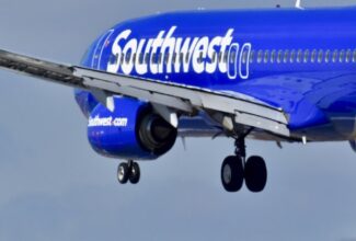 Southwest cancellations continue as rival carriers cap fares to help stranded flyers