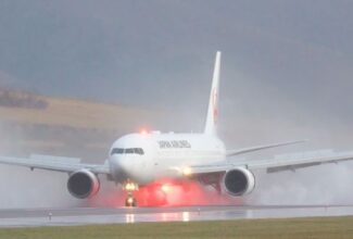 Japan Airlines jet carrying 335 forced to turn back after missing destination airport's closing time by 10 minutes