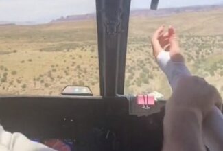 Shocking Moment on Helitour as Passenger Attempts Dangerous Act