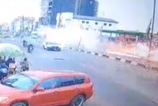 Plane avoids traffic as it crashes onto busy street and bursts into flames: video