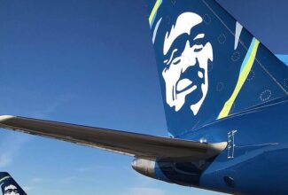 Alaska Airlines Passenger Charged After Trying to Open Cabin Door Midflight
